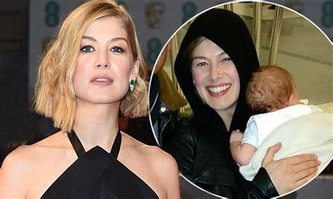 Rosamund Pike stripped off to breastfeed son Atom at BAFTAs